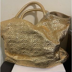 Vintage gold Fila tote/beach bag/carryall. Inside pockets